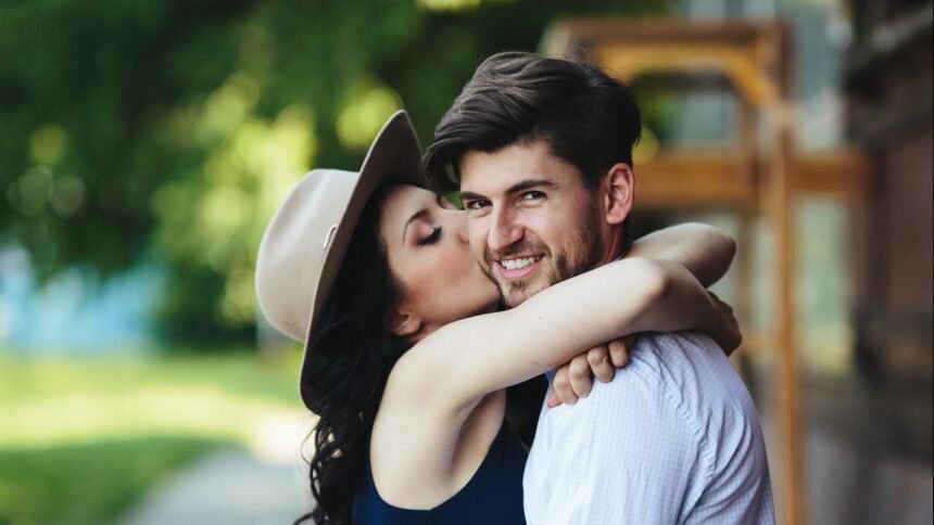 Young couple moving in together due to inflation, illustrating rising cost of living and cohabitation trends