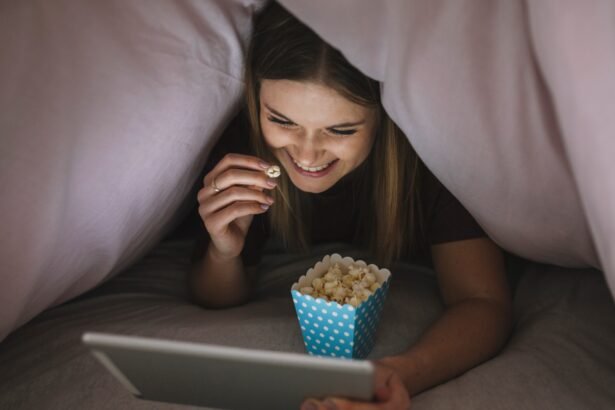 Cheerful woman watching a movie